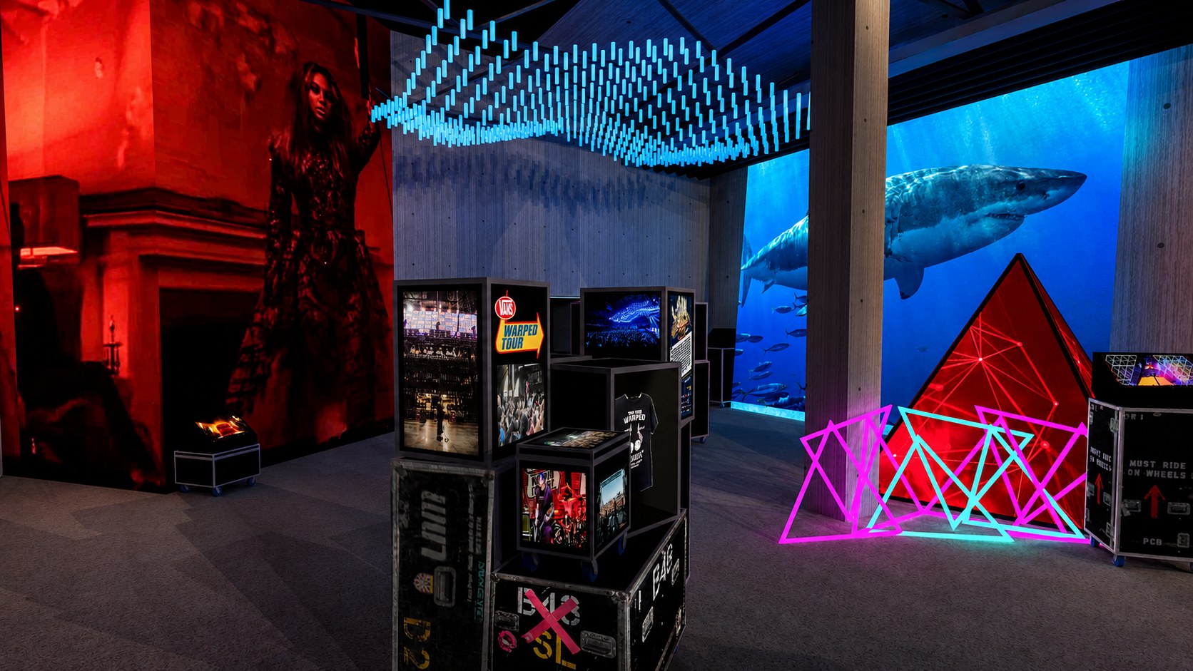 Rendering: the modern section with a Vans Warped Tour case cluster, large LED walls showing performance imagery, a red LED pyramid and a suspended array of blue light tubes overhead
