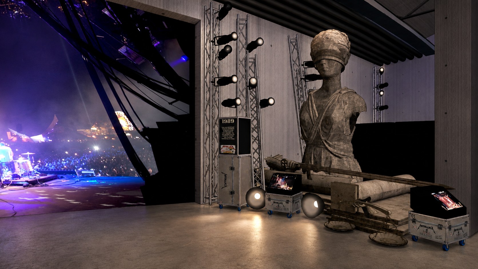 Rendering: the Lady Justice statue from Metallica's Damaged Justice tour, broken into sections on the gallery floor beside truss towers and Metallica road cases, with the stadium screen glowing at left
