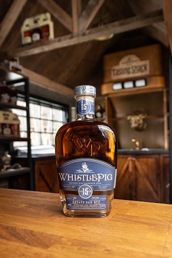 WhistlePig 15 year bottle on the bar inside the shack